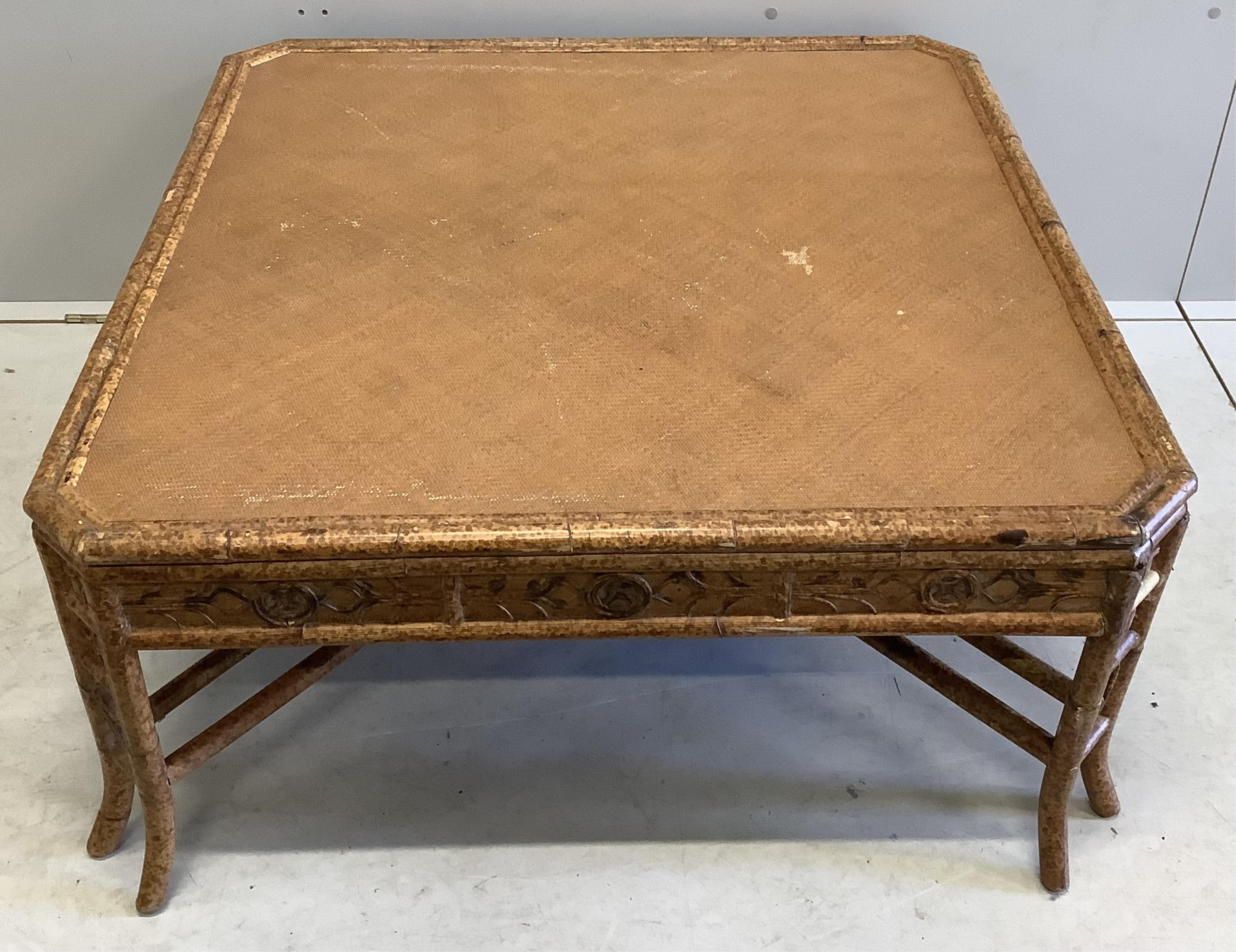 A square bamboo and rattan coffee table, width 94cm, height 44cm. Condition - fair